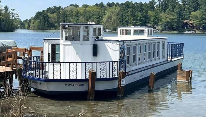 Lady of the Lakes cruise tour boat on the Chain O' Lakes at Clear Water Harbor restaurant and bar in Waupaca, WI